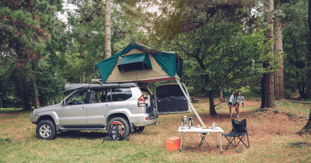 awd vs 4wd rooftop tent camper in the woods offroad